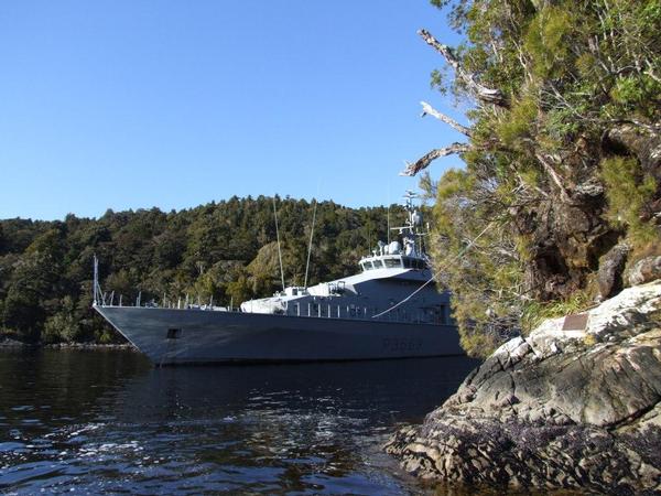 HMNZS ROTOITI moored in Pickersgill Harbour, with commemorative plaque at right.